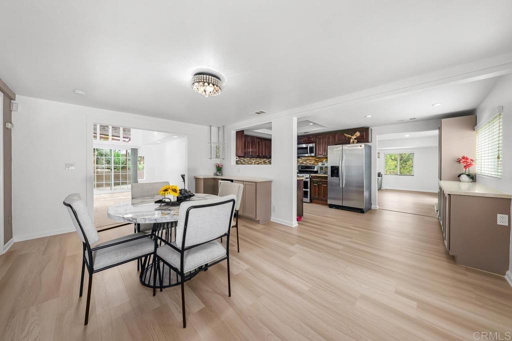 1661 Grove Road El Cajon, CA 92020 - Photo 6 of 44 a living room with furniture and a wooden floor