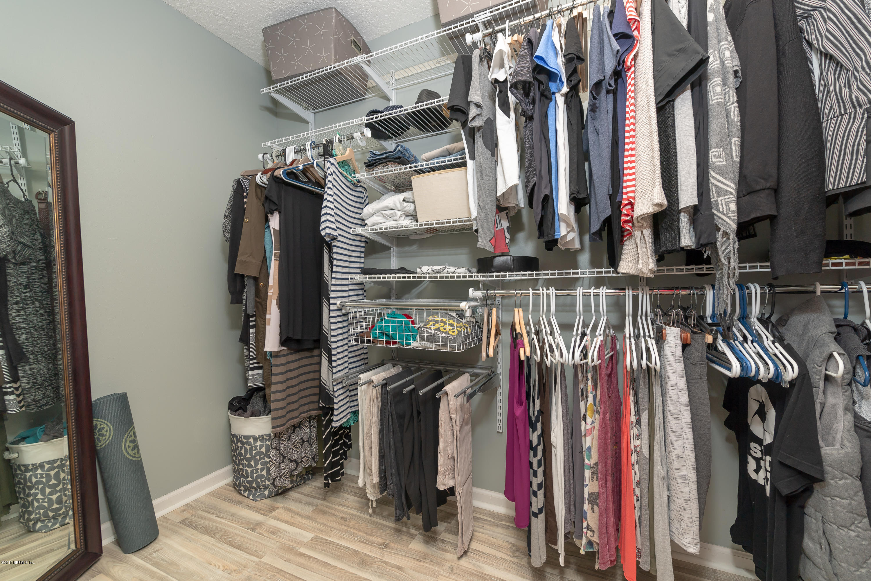1565 Timber Trace Drive St. Augustine, FL 32092 - Photo 13 of 21 a view of walk in closet with clothes