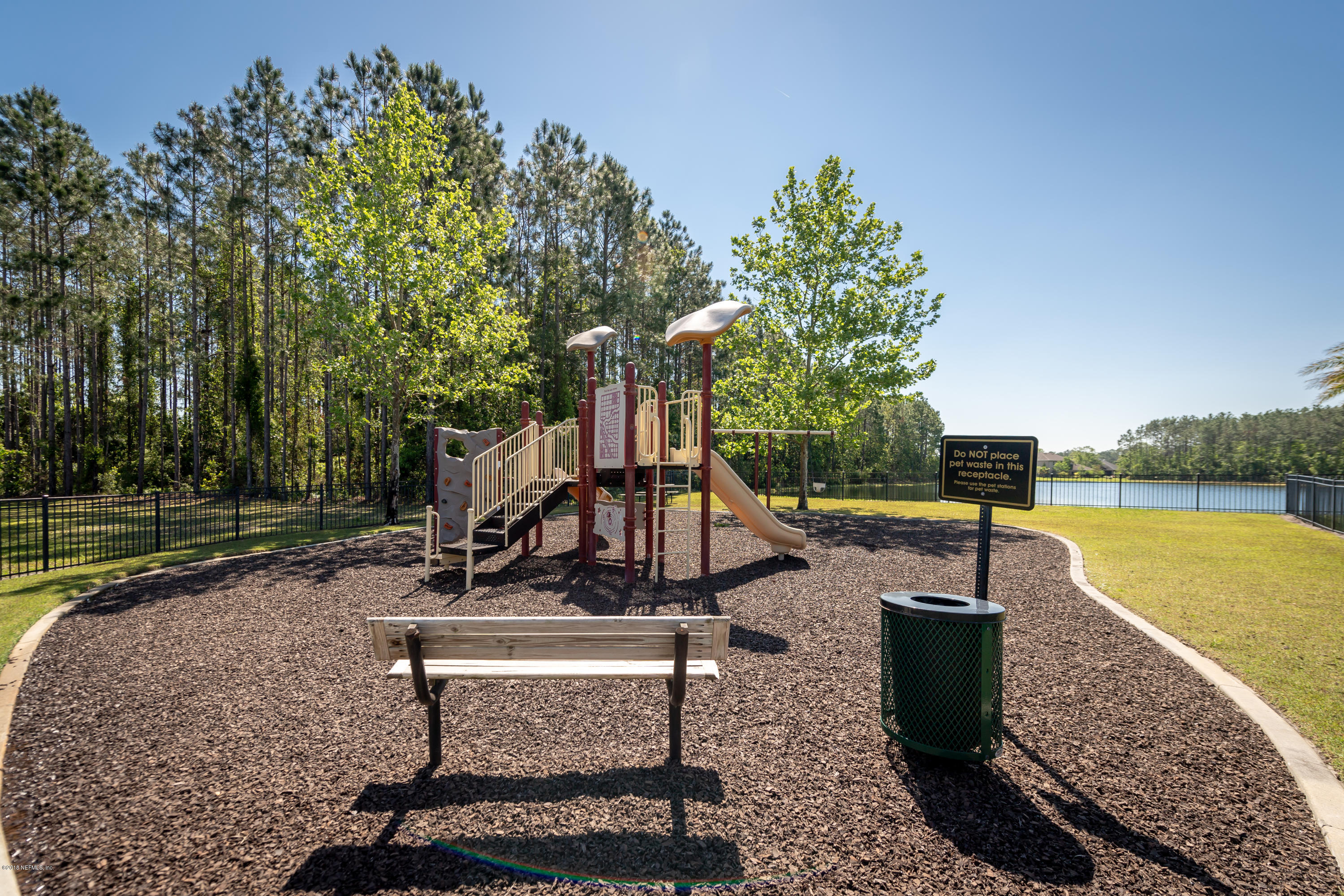 1565 Timber Trace Drive St. Augustine, FL 32092 - Photo 21 of 21 a park view with a slide