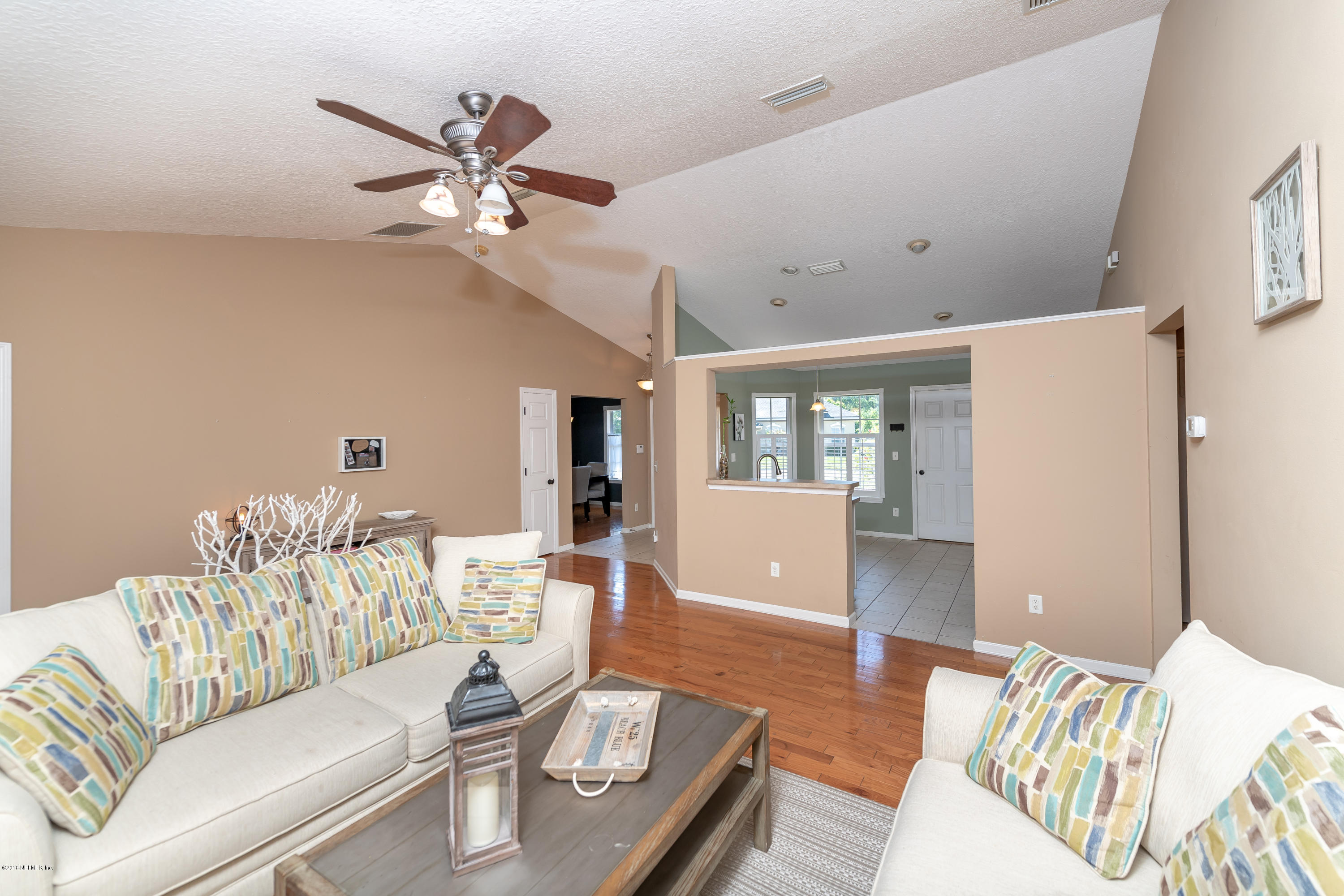 1565 Timber Trace Drive St. Augustine, FL 32092 - Photo 4 of 21 a living room with furniture and a large window