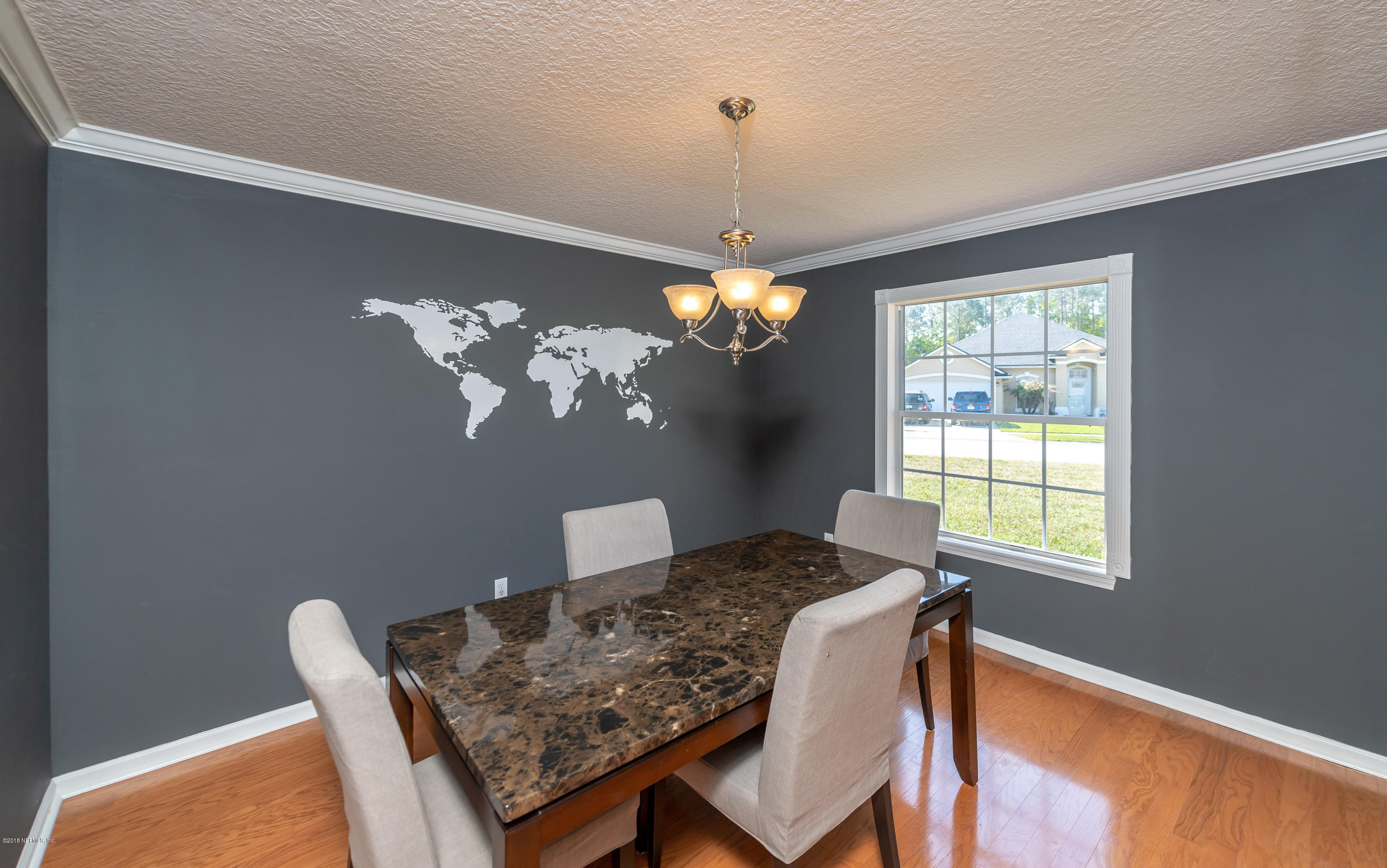 1565 Timber Trace Drive St. Augustine, FL 32092 - Photo 7 of 21 a dining room with furniture and chandelier