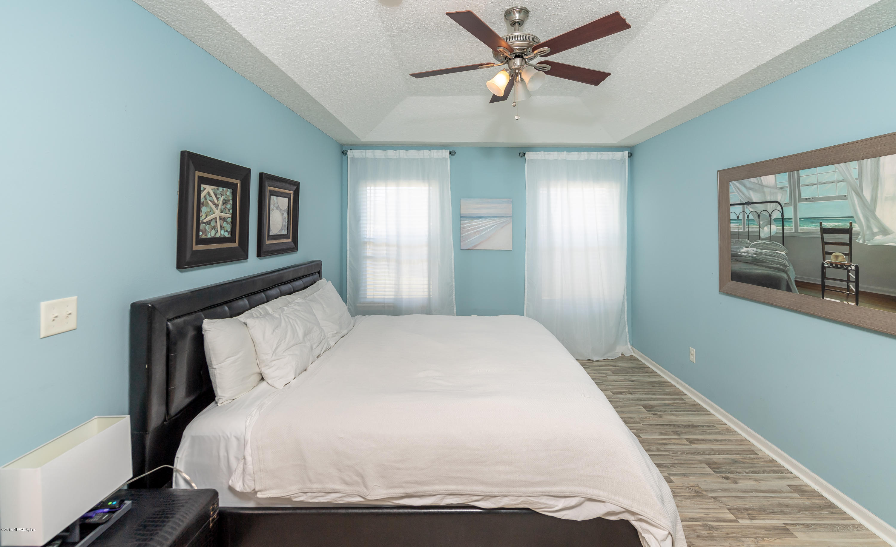 1565 Timber Trace Drive St. Augustine, FL 32092 - Photo 10 of 21 a bedroom with a large bed and a window