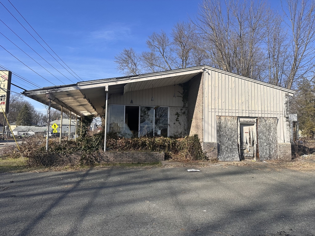 445 Chicopee Street Chicopee, MA 01013 - Photo 4 of 14 a view of house with outdoor space