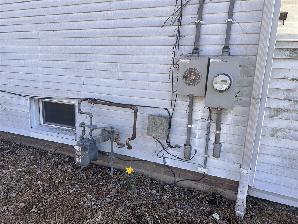 445 Chicopee Street Chicopee, MA 01013 - Photo 8 of 14 a view of a storage and utility room