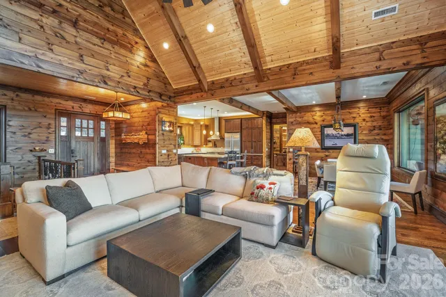 a large kitchen with a large window and stainless steel appliances