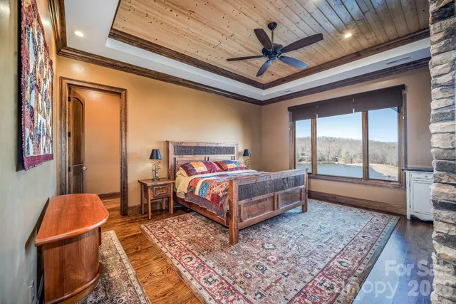 an entryway door with wooden floor