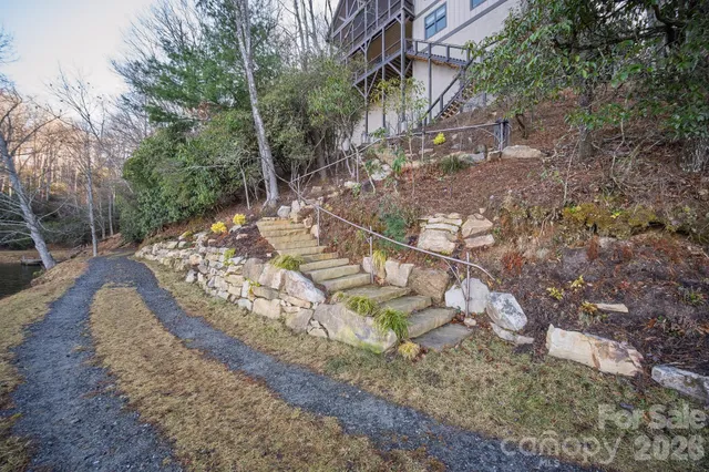 a outdoor living space with patio furniture and a fireplace