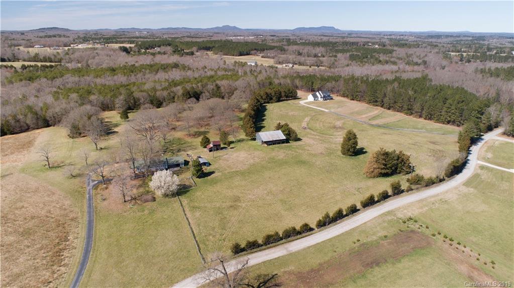 261 Currence Road Clover, SC 29710 - Photo 7 of 9 a view of a swimming pool and mountain view