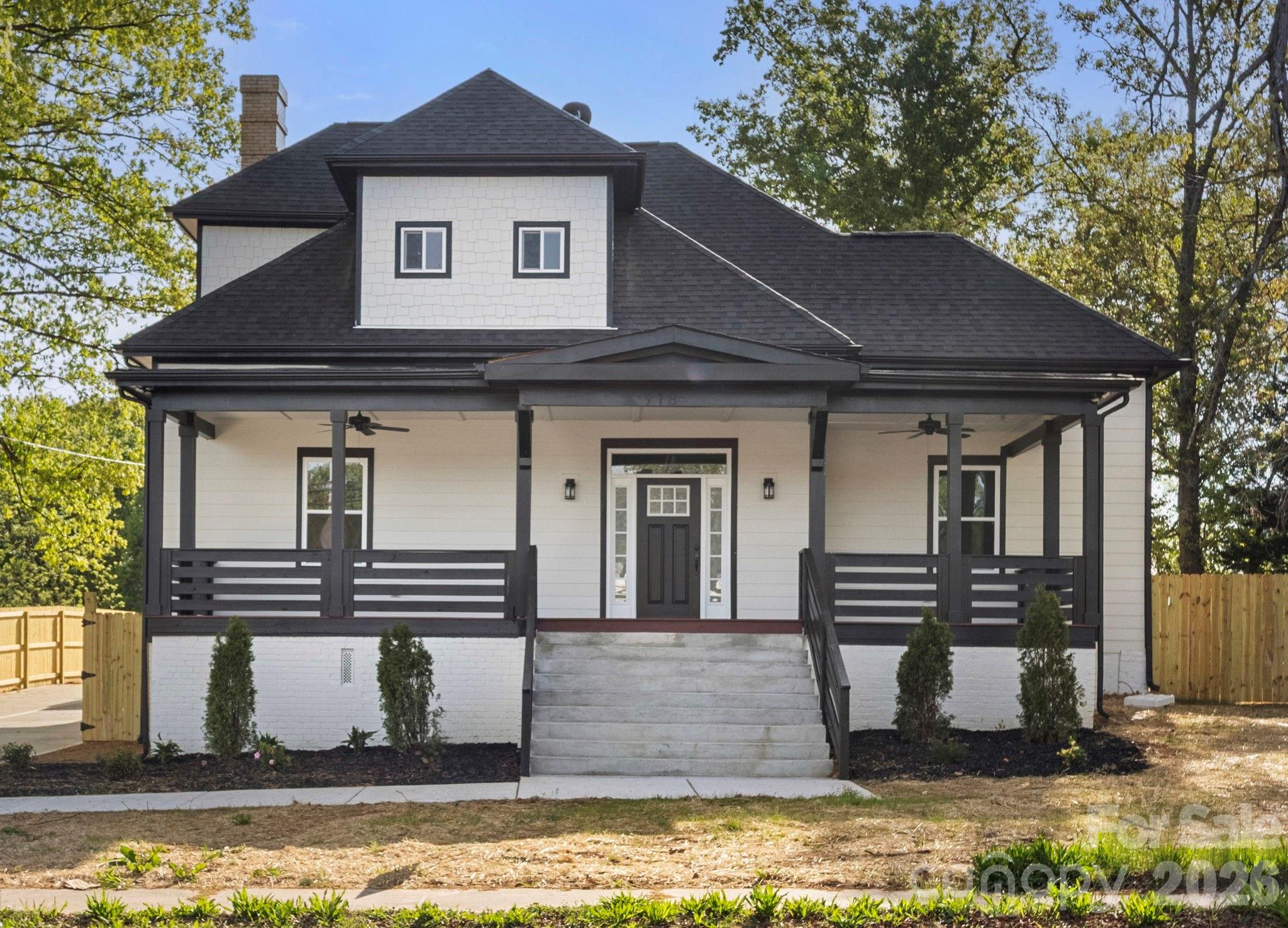 918 North New Hope Road Gastonia, NC 28054 - Photo 2 of 37 a front view of a house with garden