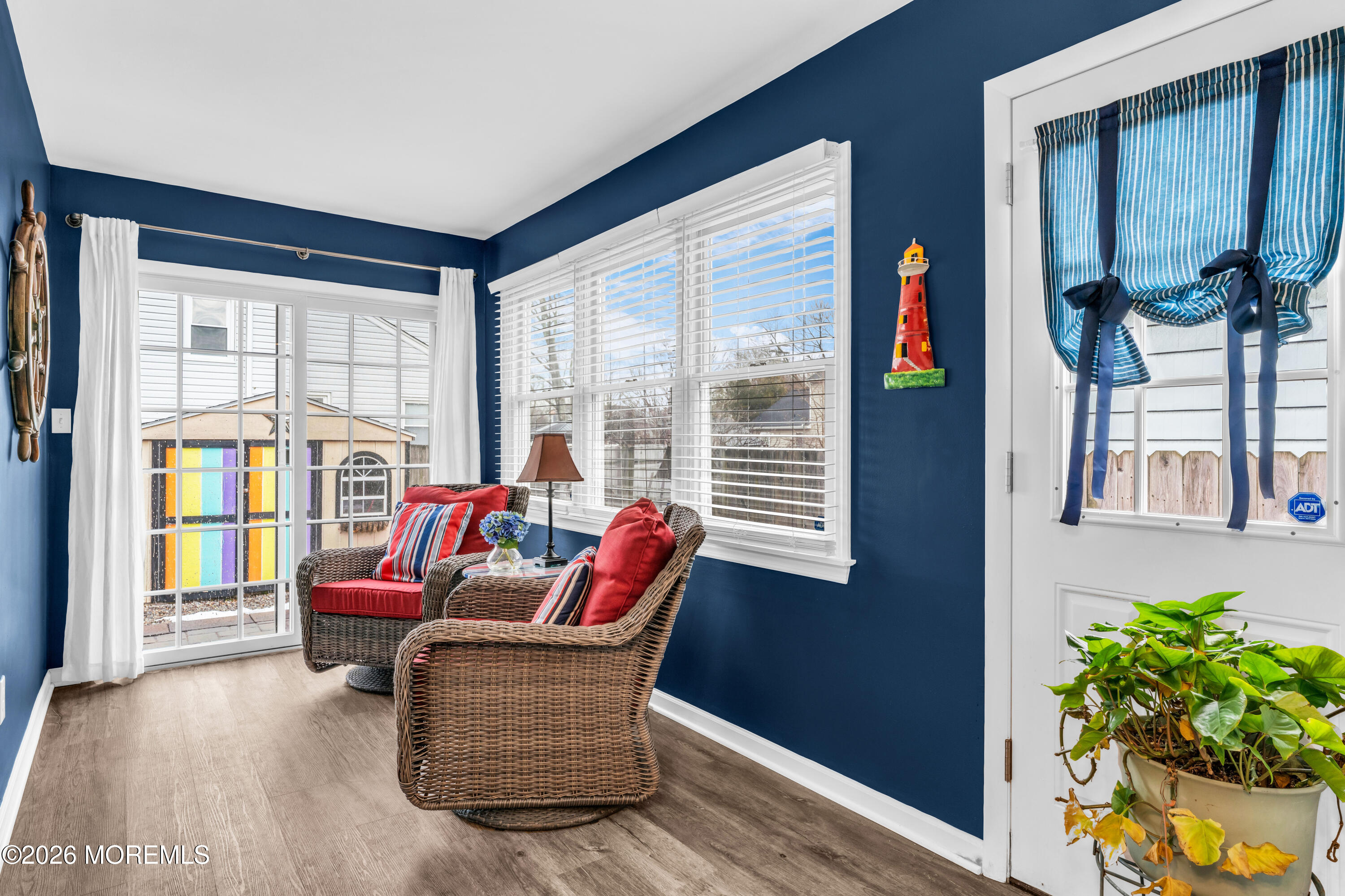 527 Delaware Avenue Point Pleasant, NJ 08742 - Photo 14 of 27 a living room with furniture and a potted plant