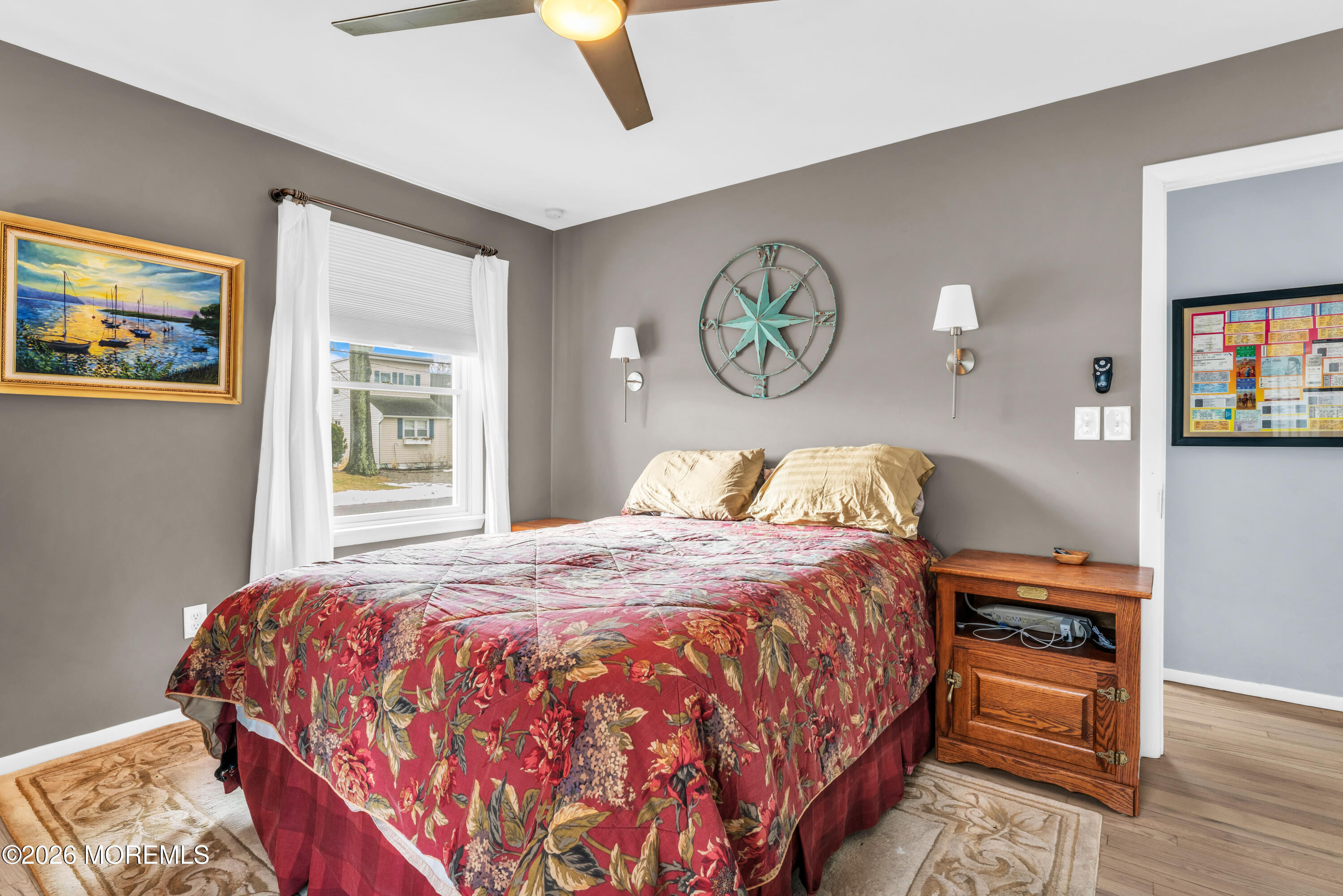 527 Delaware Avenue Point Pleasant, NJ 08742 - Photo 19 of 27 a bedroom with a bed and painting on the wall