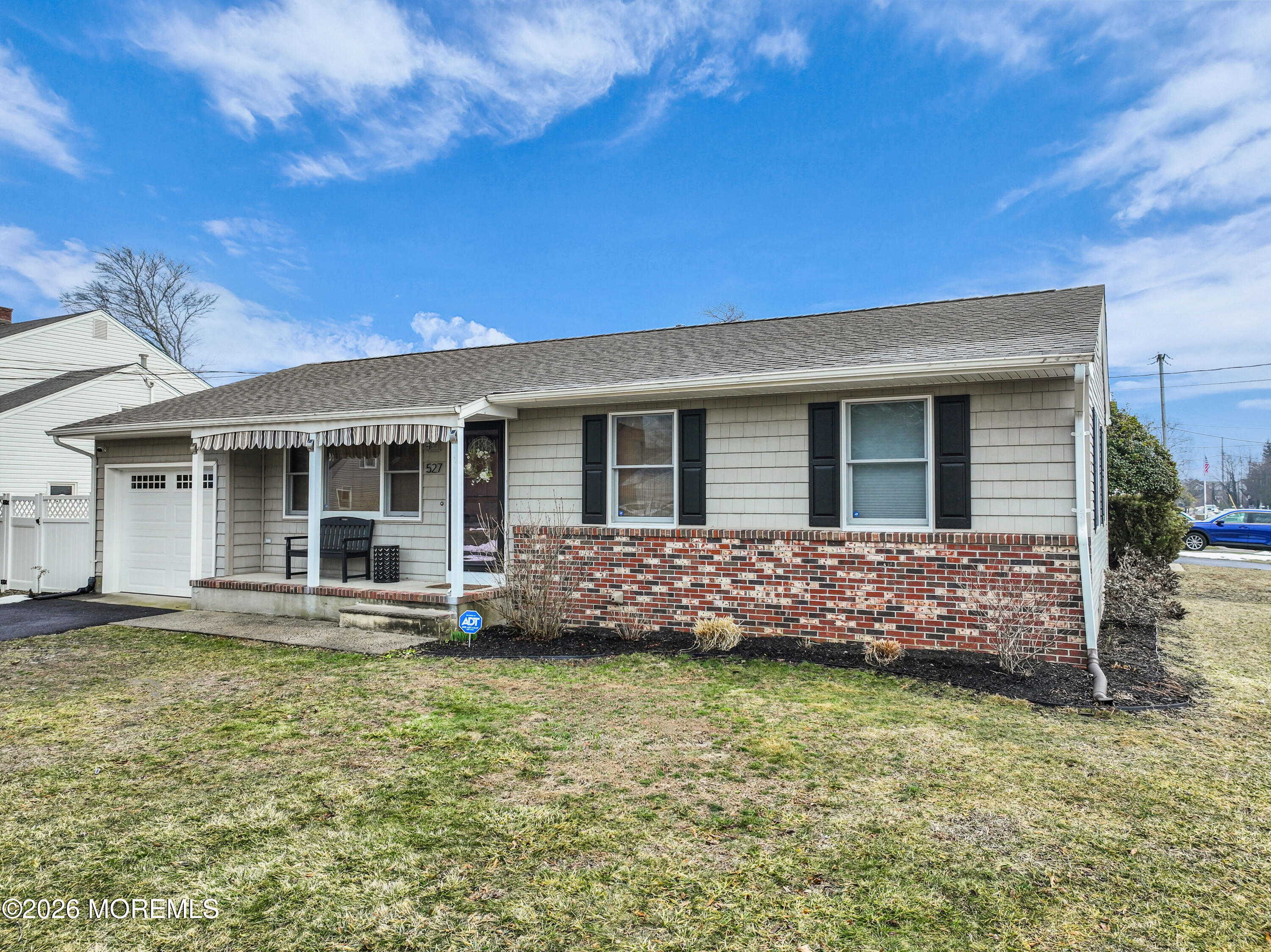 527 Delaware Avenue Point Pleasant, NJ 08742 - Photo 2 of 27 a front view of house with yard