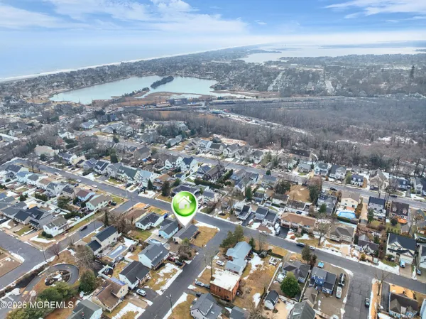 an aerial view of mountain with yard