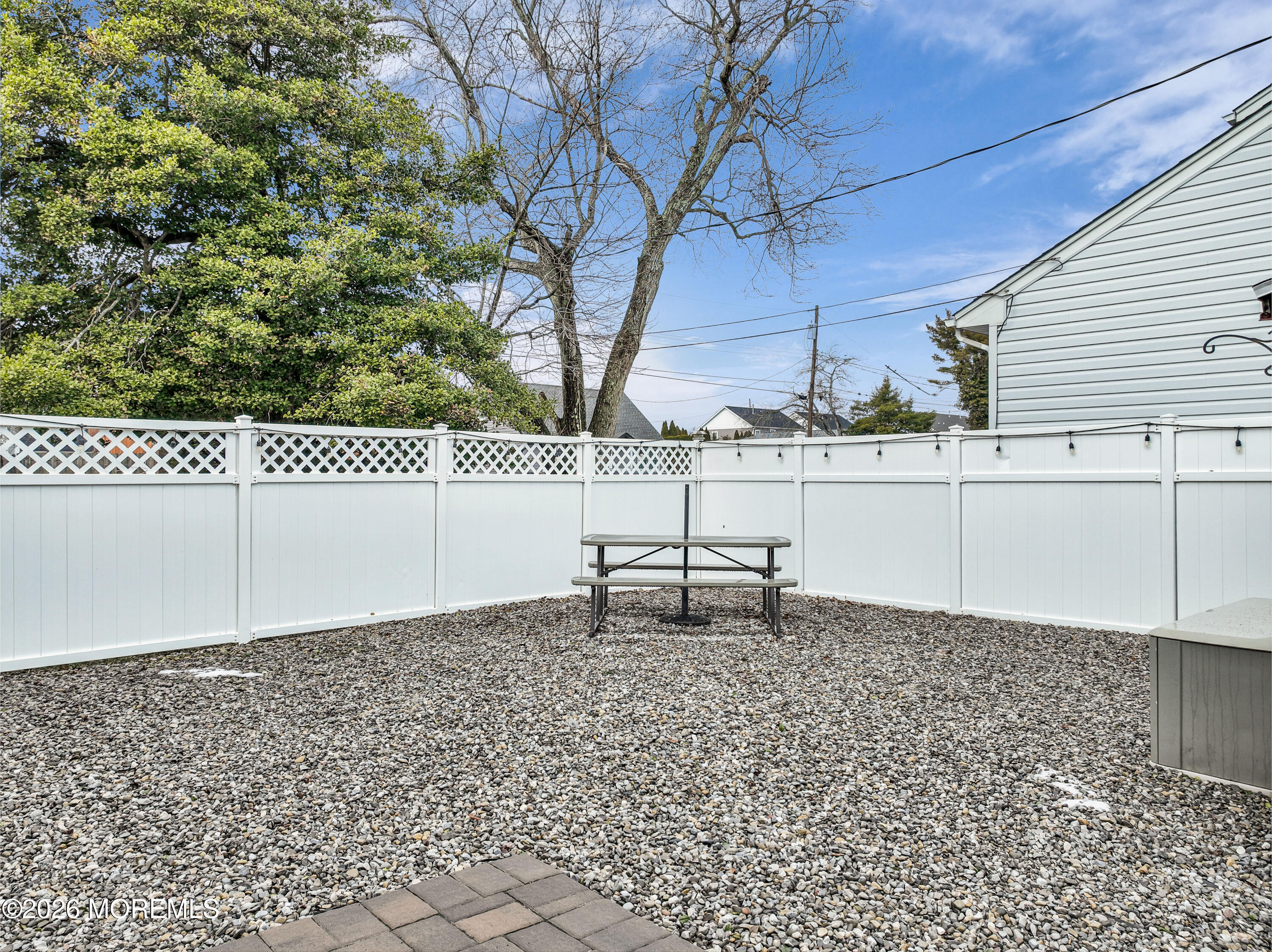 527 Delaware Avenue Point Pleasant, NJ 08742 - Photo 26 of 27 a backyard of a house with lots of green space