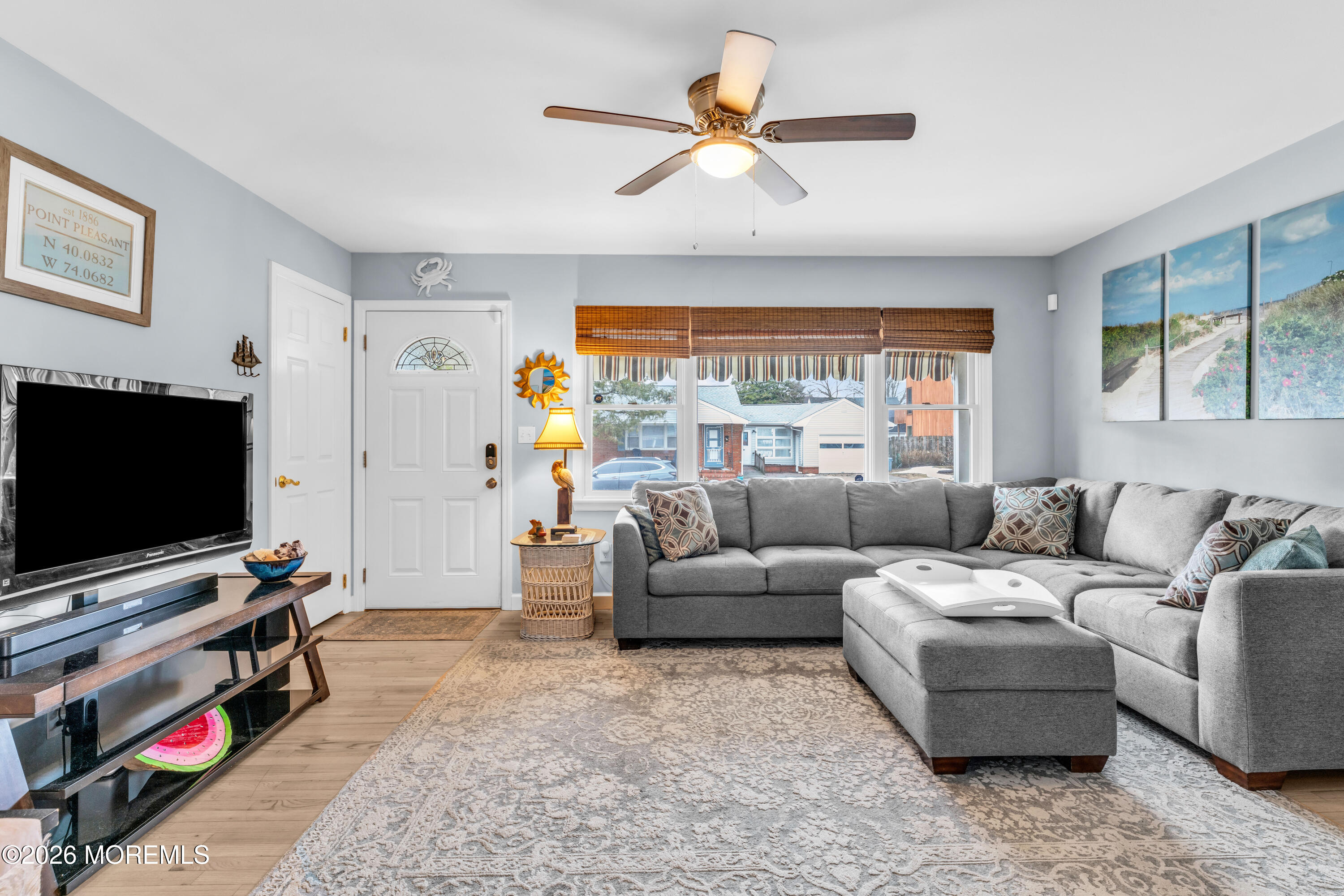 527 Delaware Avenue Point Pleasant, NJ 08742 - Photo 7 of 27 a living room with furniture and a flat screen tv