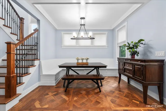 a workspace with furniture window and wooden floor
