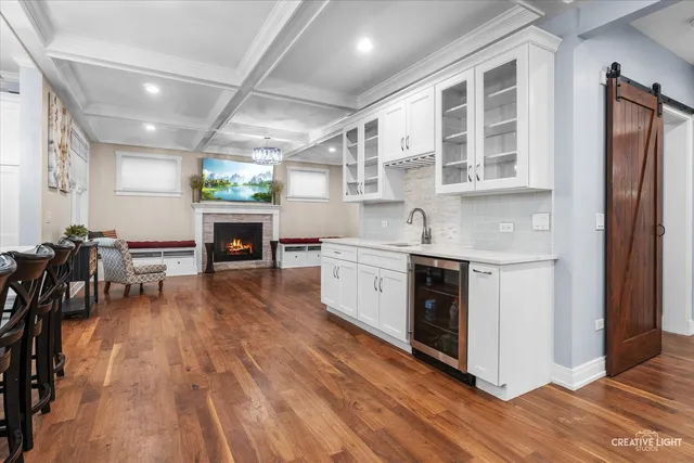 a kitchen with stainless steel appliances granite countertop a stove and a refrigerator