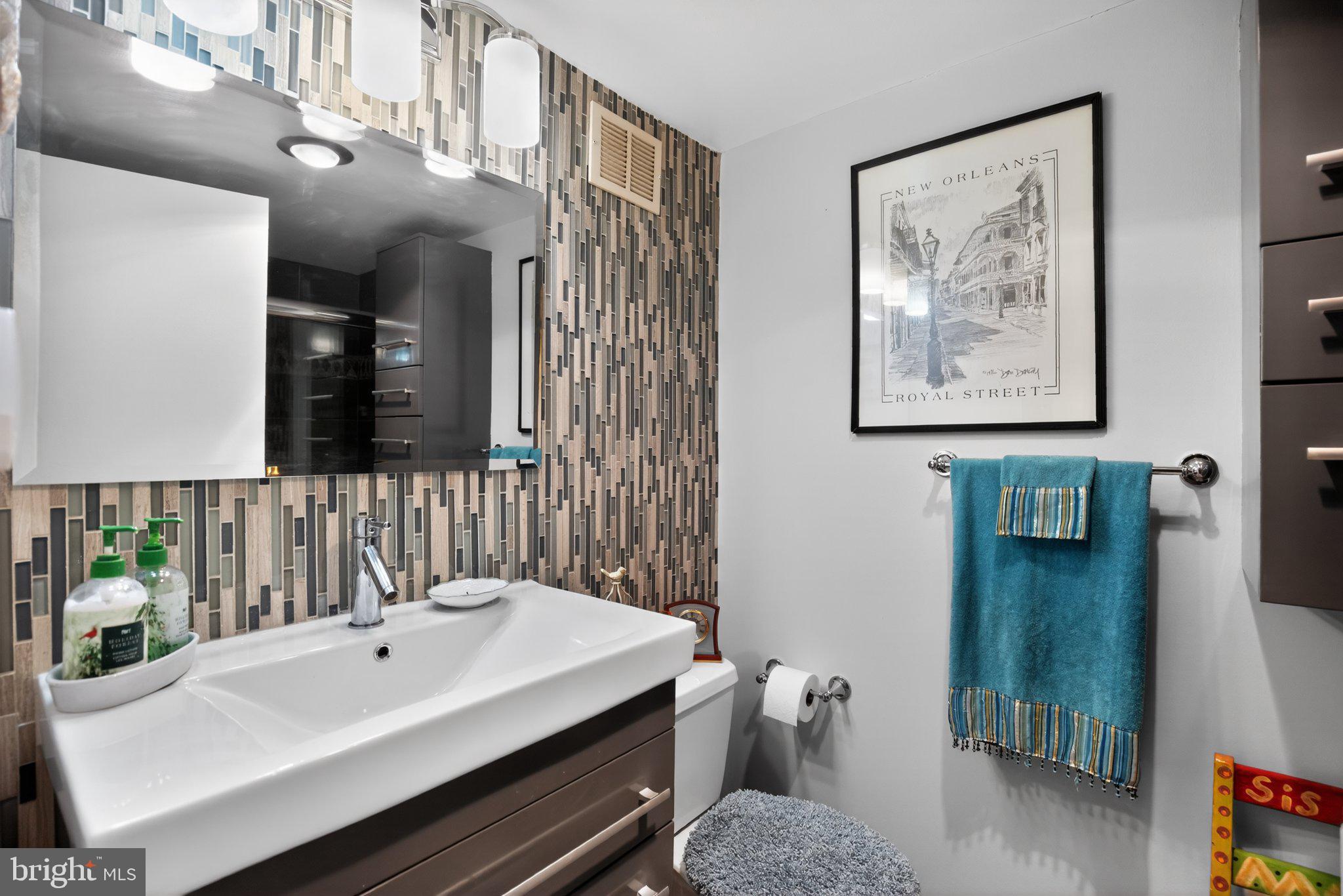 700 7th Street Southwest, Unit 526 Washington, DC 20024 - Photo 26 of 33 Chic bathroom with modern accents.