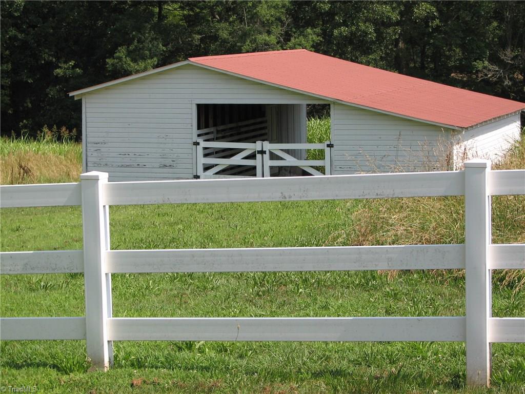 1186 Denton Road Denton, NC 27239 - Photo 5 of 30 Barn & lots of white fencing!