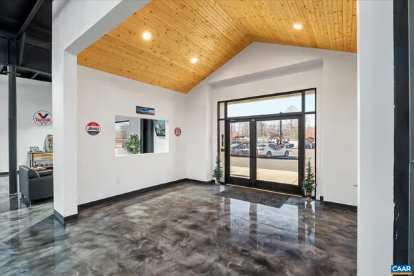 a room with furniture and a window