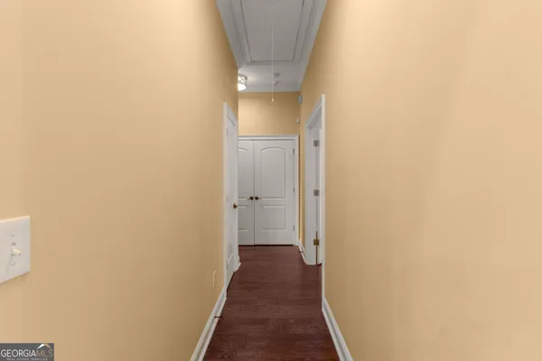 a view of entryway with wooden floor