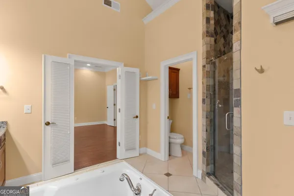 a kitchen with stainless steel appliances granite countertop a refrigerator sink and cabinets
