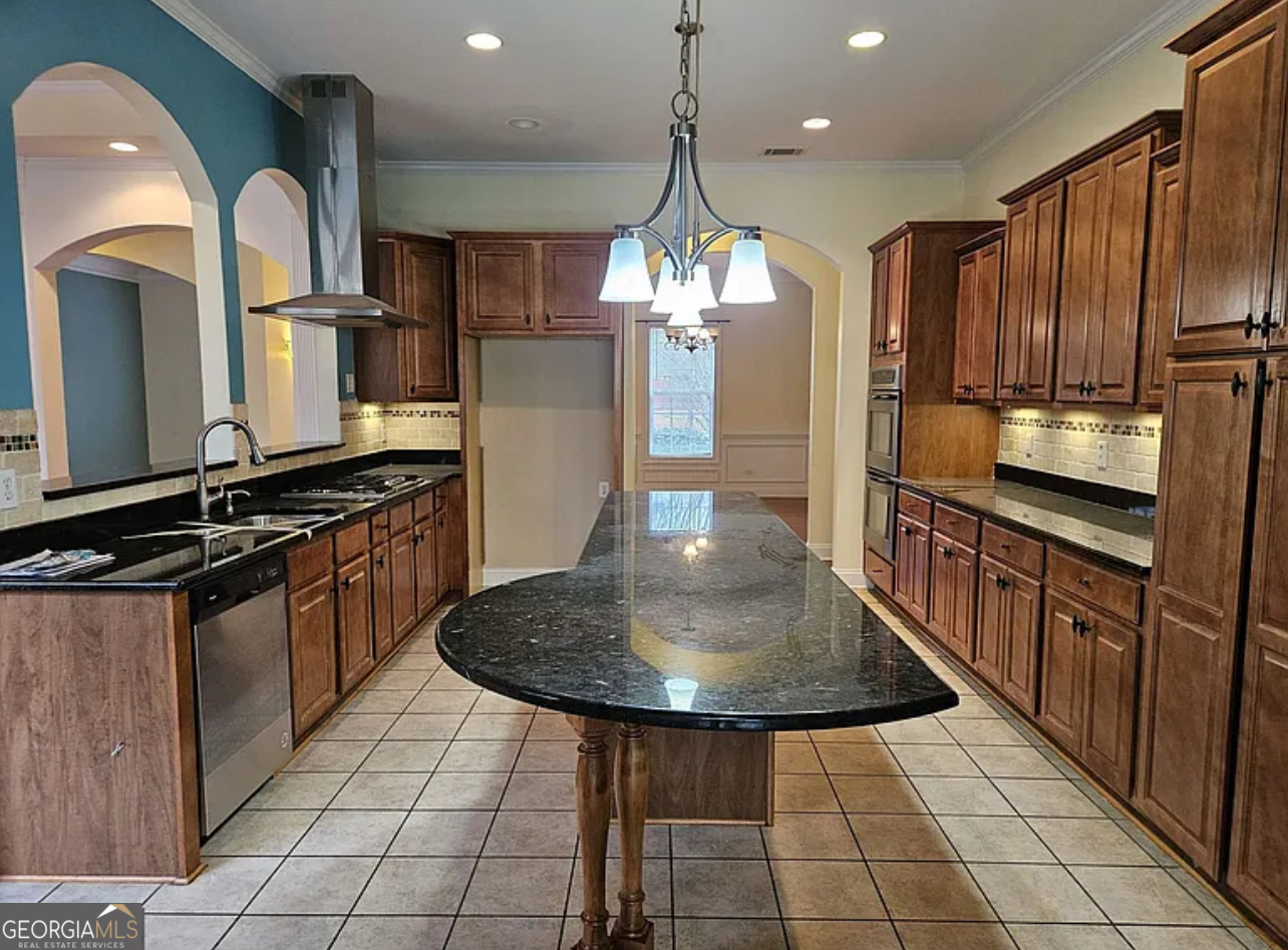 968 Mill Road McDonough, GA 30253 - Photo 50 of 77 a kitchen with stainless steel appliances kitchen island granite countertop a stove a sink and a refrigerator
