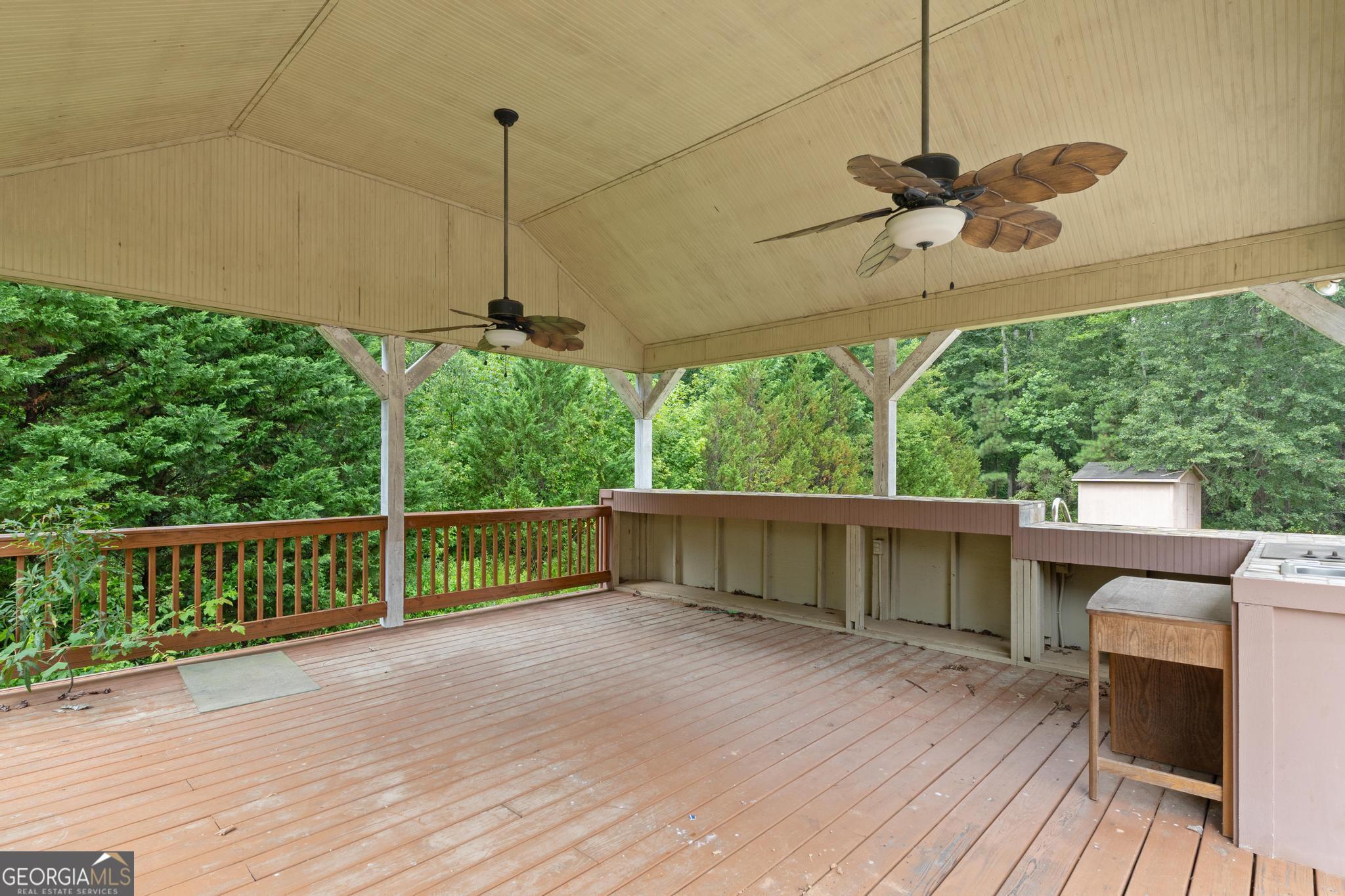 968 Mill Road McDonough, GA 30253 - Photo 52 of 77 a view of a balcony with furniture