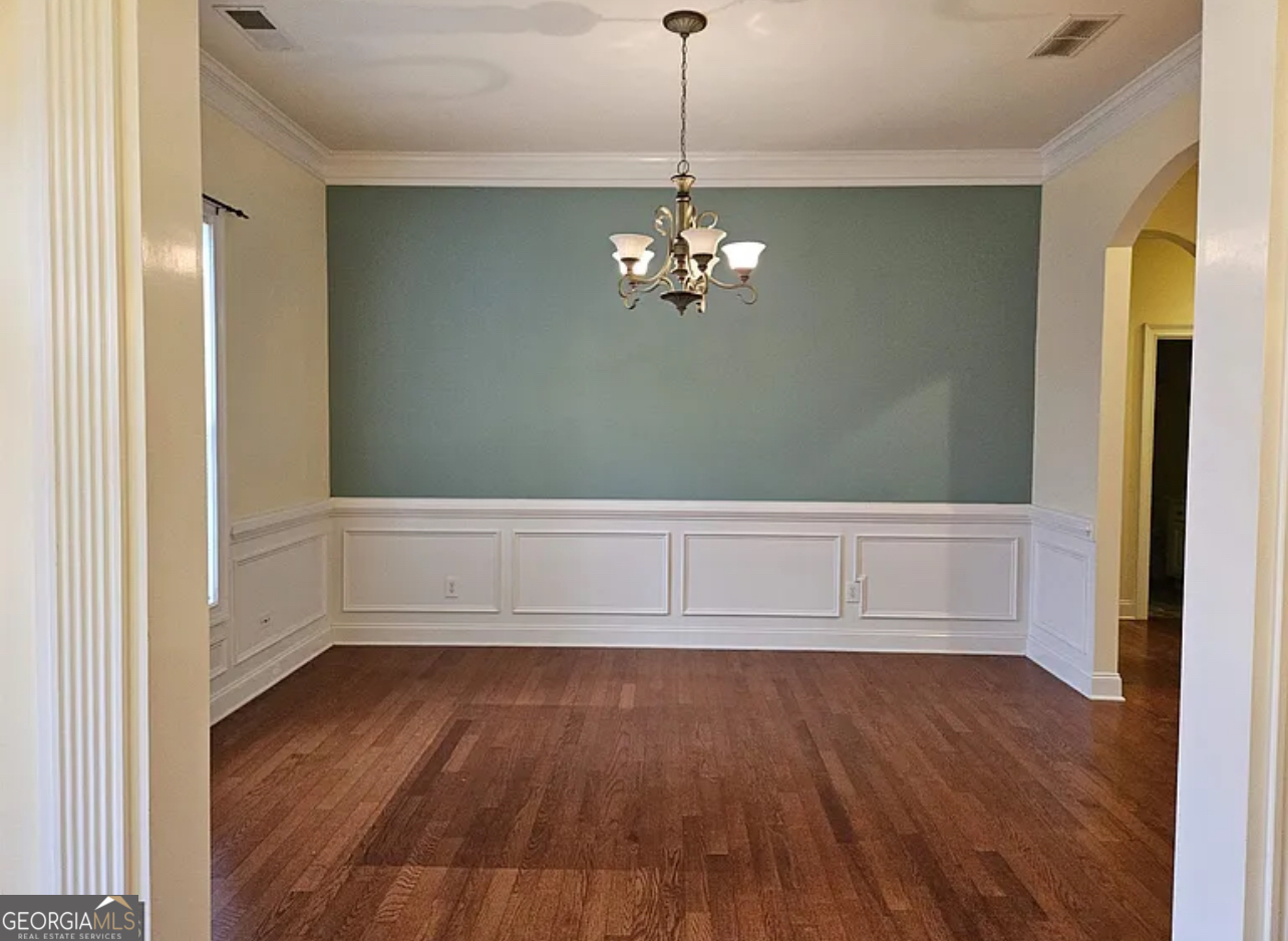968 Mill Road McDonough, GA 30253 - Photo 54 of 77 a view of wooden floor and windows in a room