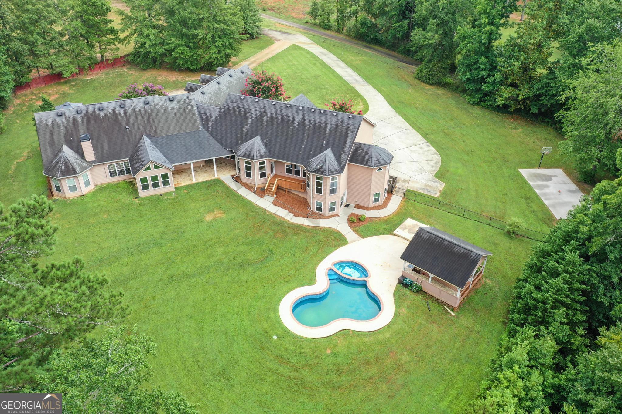 968 Mill Road McDonough, GA 30253 - Photo 77 of 77 a garden view with a seating space