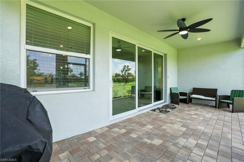 28165 Captiva Shell Loop Bonita Springs, FL 34135 - Photo 28 of 38 a view of outdoor space with deck and window
