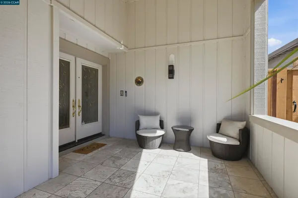 a view of a living room and dining room