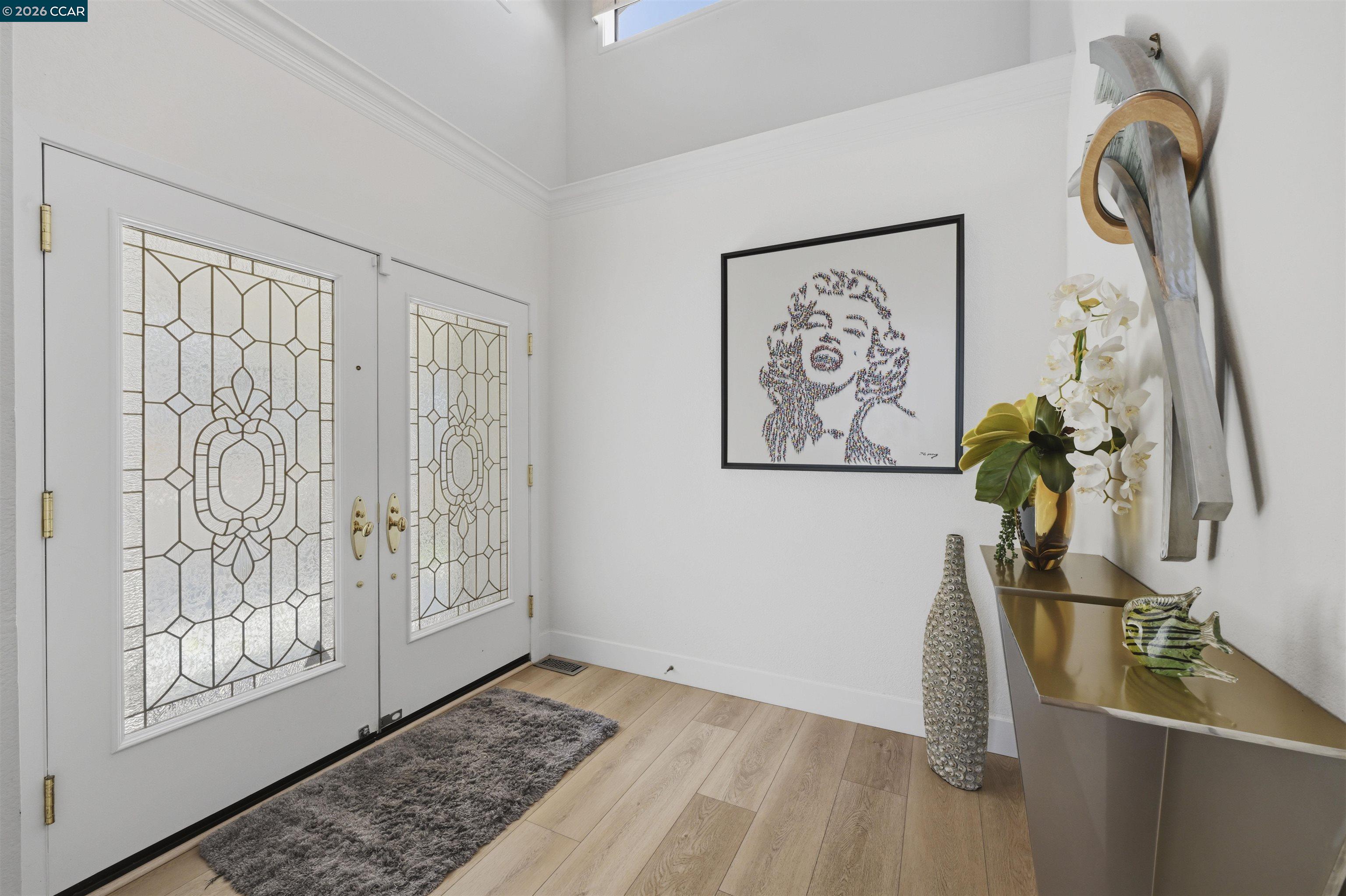 2027 Windward Point Discovery Bay, CA 94505 - Photo 13 of 53 a view of an entryway with wooden floor