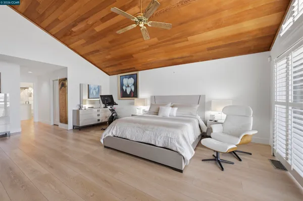 a bathroom with a double vanity sink mirror double and shower