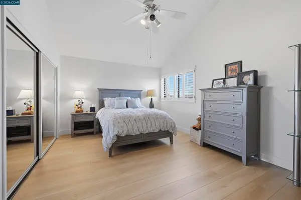 a bathroom with a double vanity sink a vanity and a mirror