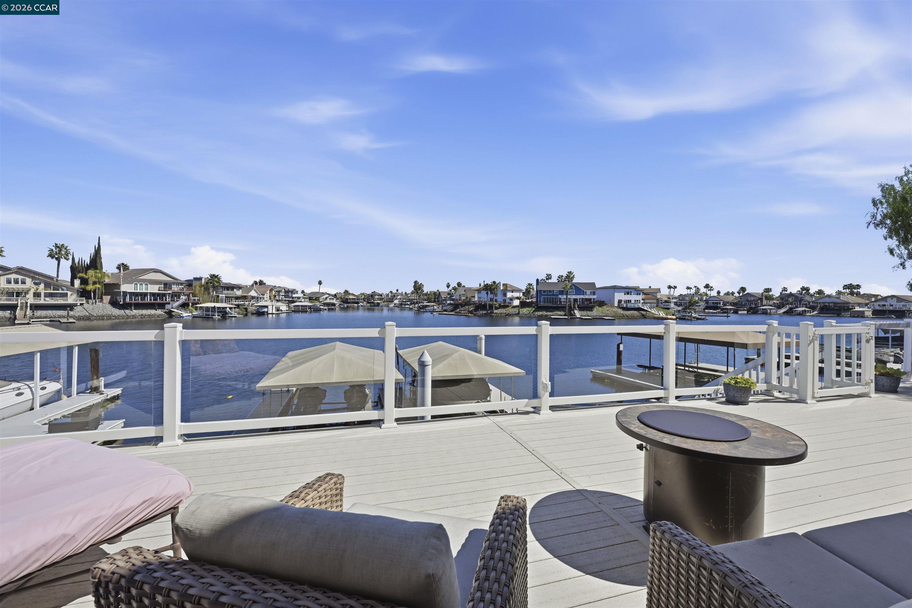 2027 Windward Point Discovery Bay, CA 94505 - Photo 39 of 53 a roof deck with a table and chairs
