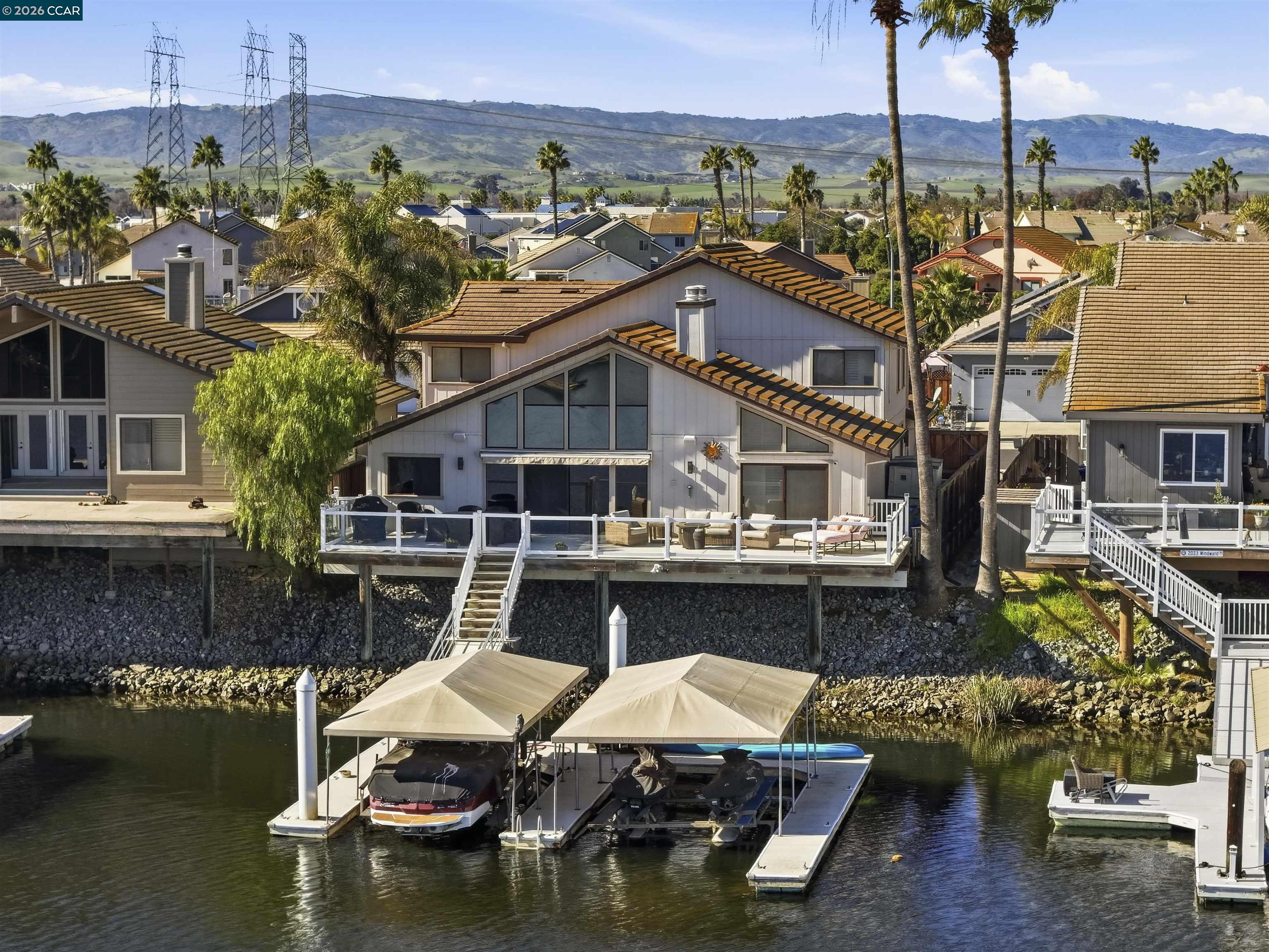 2027 Windward Point Discovery Bay, CA 94505 - Photo 45 of 53 a aerial view of a house with swimming pool and large trees