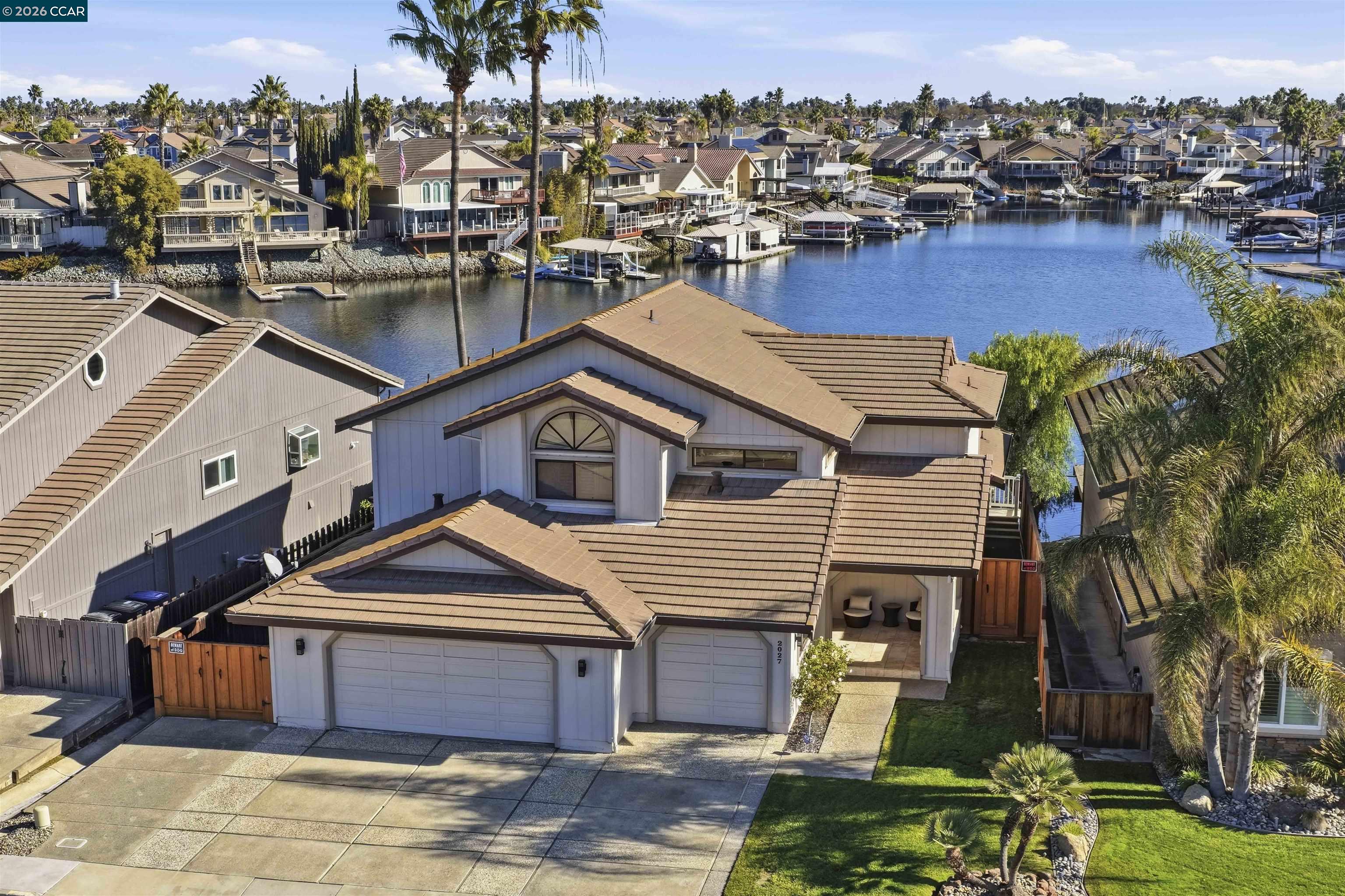 2027 Windward Point Discovery Bay, CA 94505 - Photo 48 of 53 a front view of a house with a yard