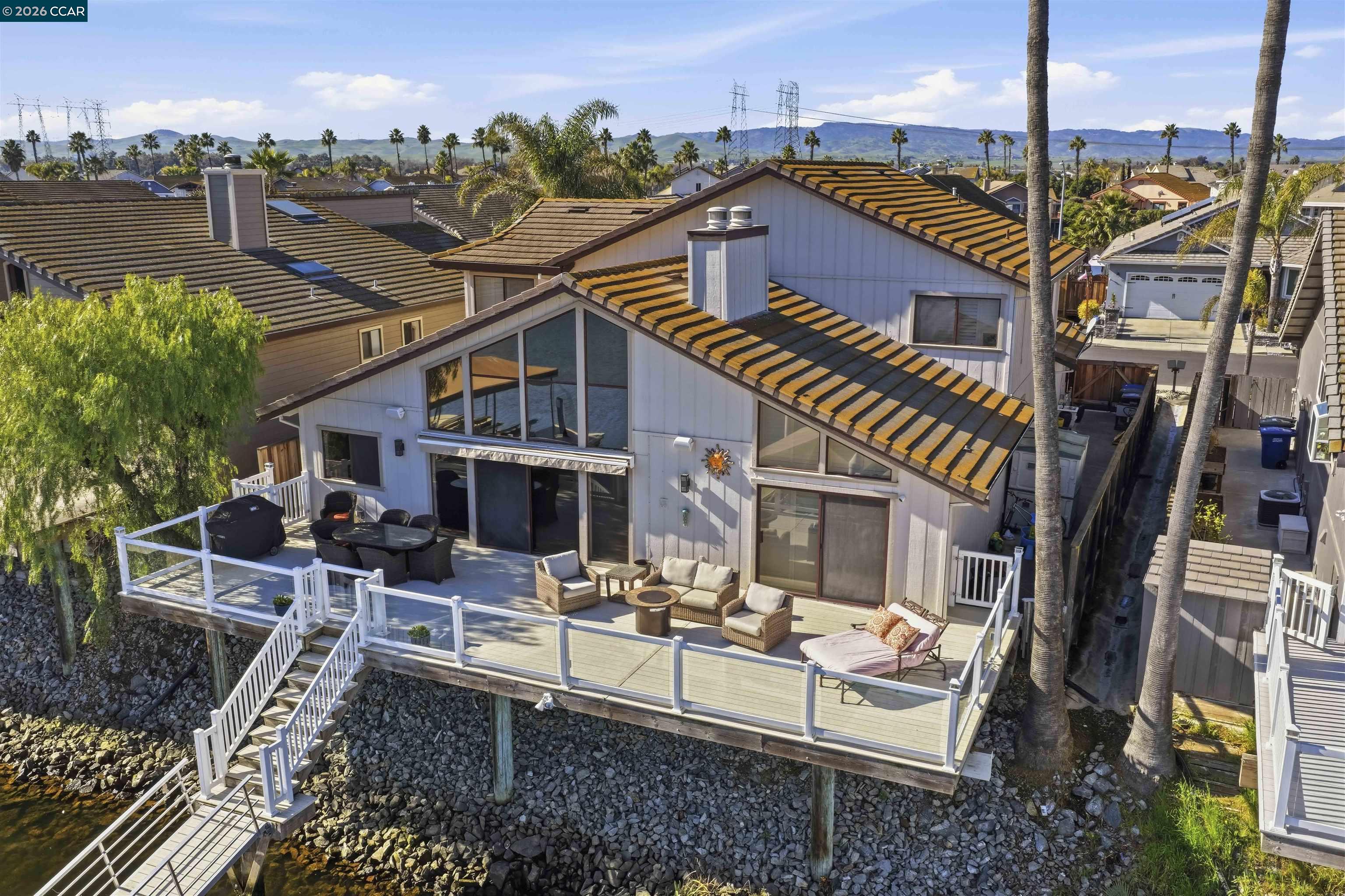 2027 Windward Point Discovery Bay, CA 94505 - Photo 7 of 53 a view of a house with backyard and porch