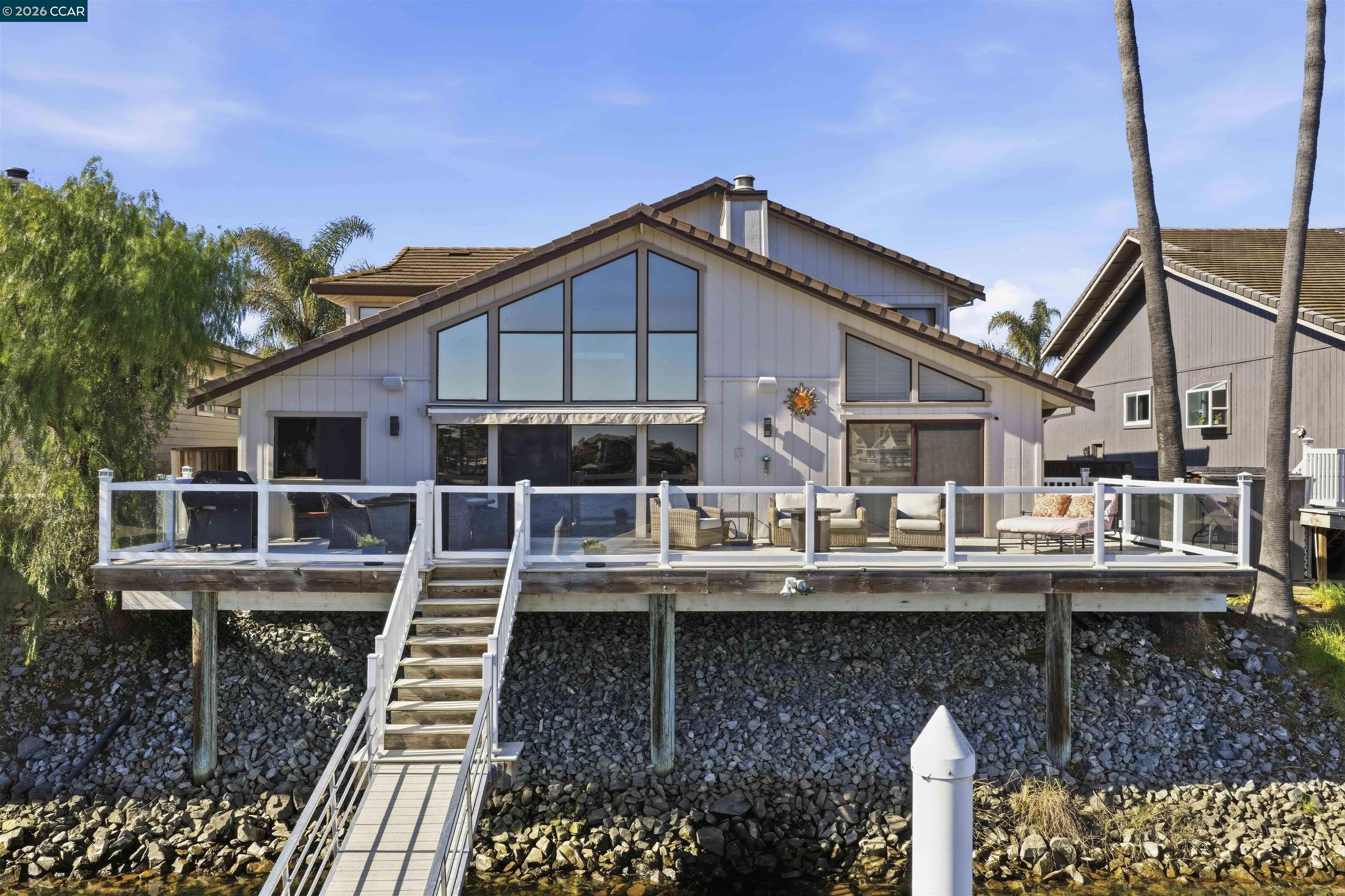 2027 Windward Point Discovery Bay, CA 94505 - Photo 8 of 53 a front view of a house with a balcony