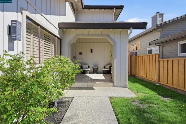 a living room with a toilet and a rug