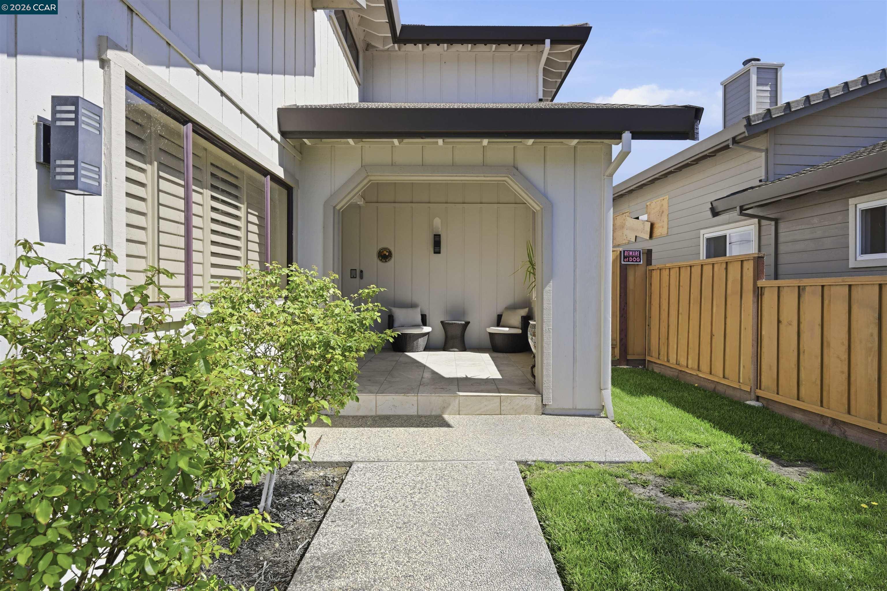 2027 Windward Point Discovery Bay, CA 94505 - Photo 10 of 53 a front view of a house with garden