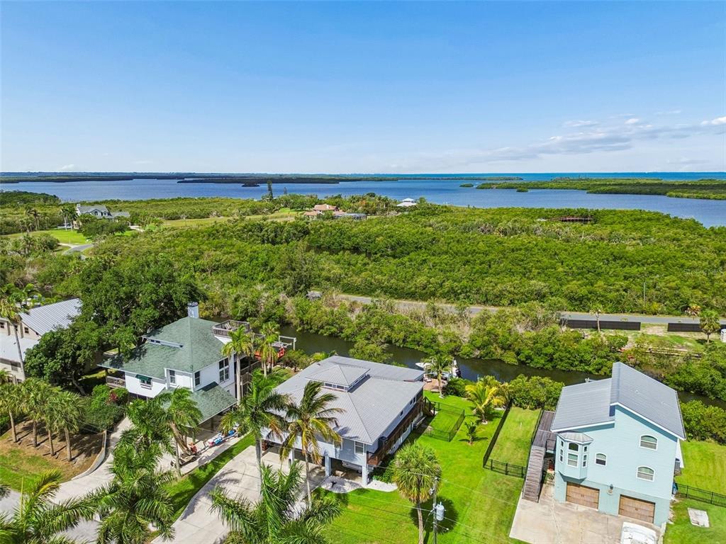 119 Burns Road Terra Ceia, FL 34250 - Photo 90 of 100 an aerial view of a house with a lake view