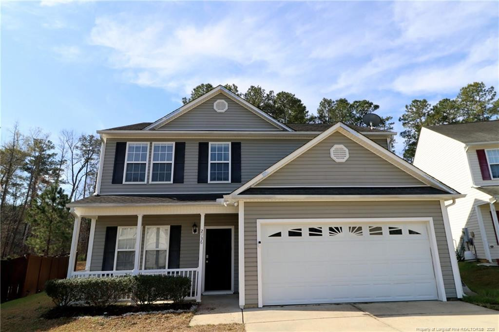 2936 Filbert Street Raleigh, NC 27610 - Photo 1 of 27 a front view of a house with a yard