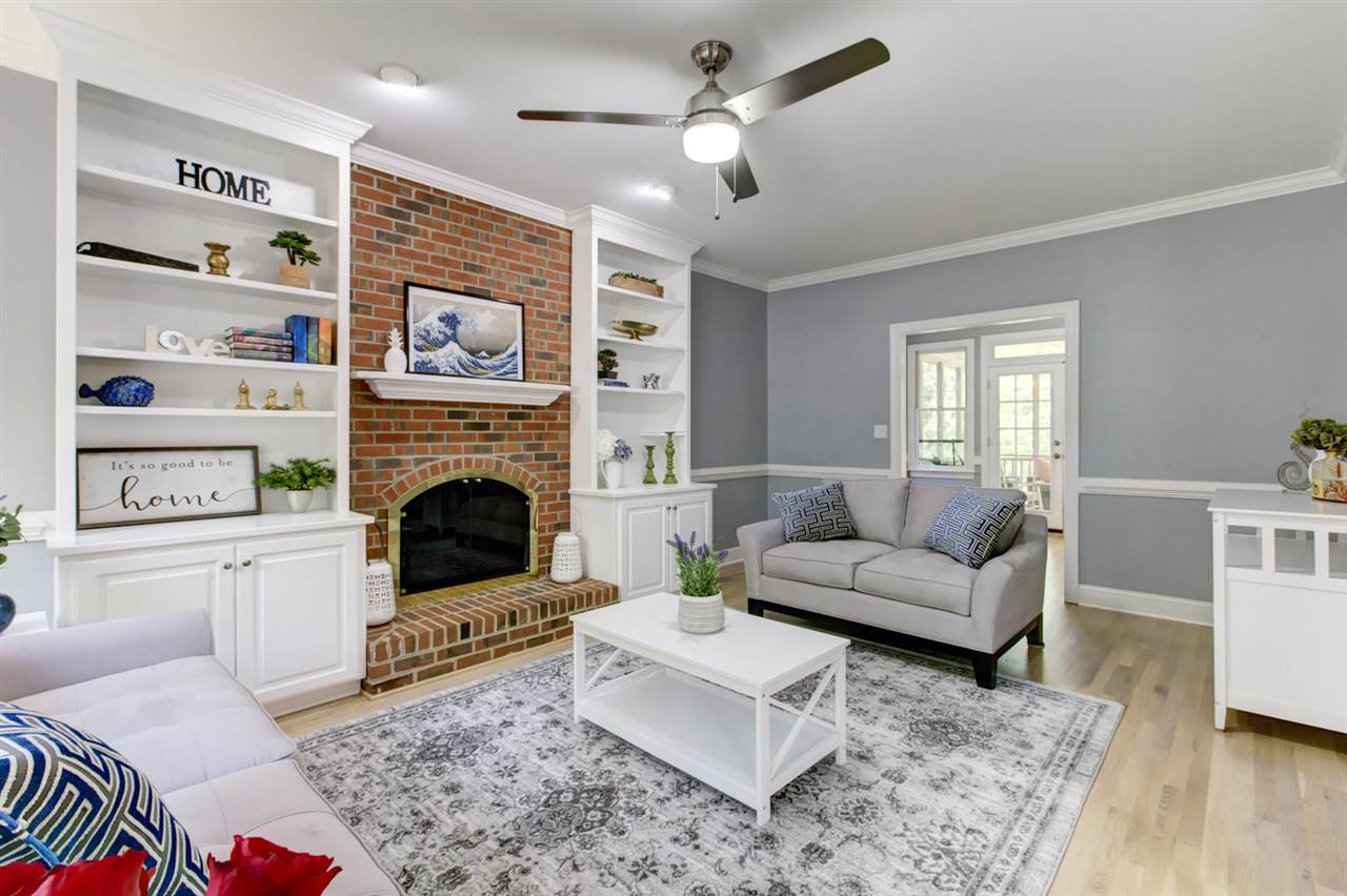 4608 Salem Ridge Road Holly Springs, NC 27540 - Photo 3 of 30 Large Family Room with Masonry Fireplace Flanked by Built Ins Family Room