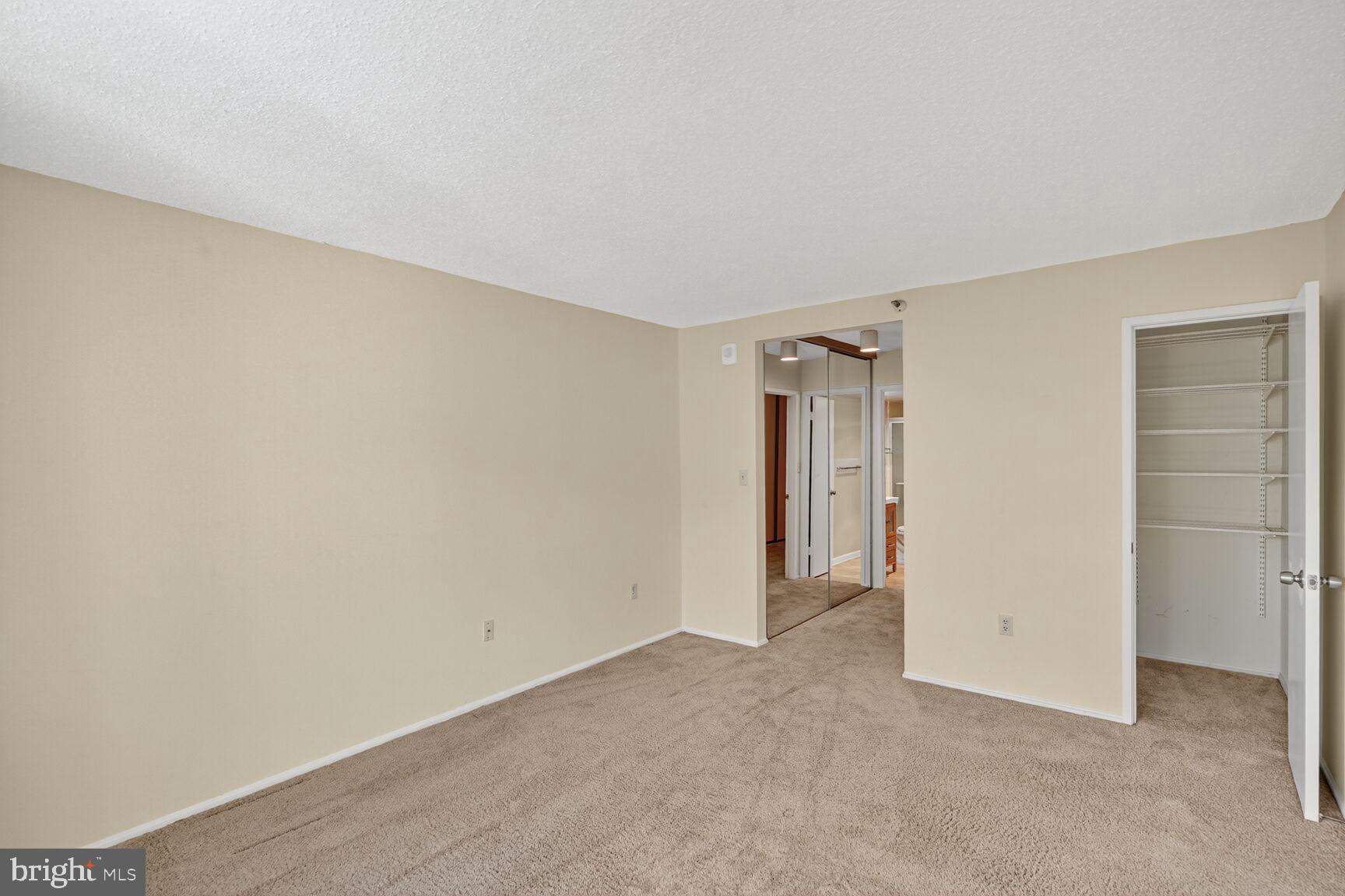 15101 Interlachen Drive, Unit 1123 Silver Spring, MD 20906 - Photo 12 of 29 a view of an empty room and closet area