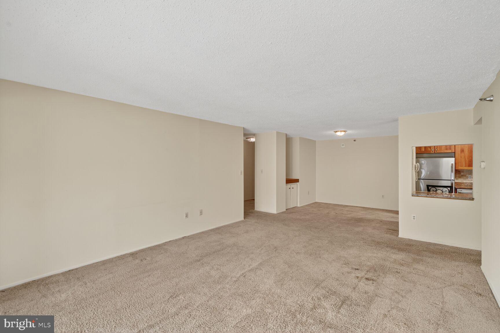 15101 Interlachen Drive, Unit 1123 Silver Spring, MD 20906 - Photo 6 of 29 a view of an empty room