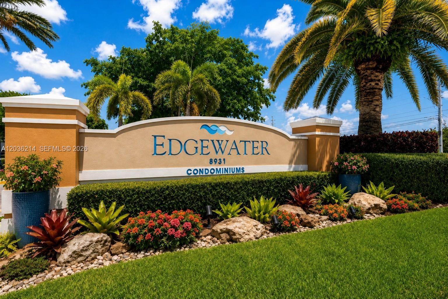 8741 Wiles Road, Unit 204 Coral Springs, FL 33067 - Photo 11 of 16 a sign that is in front of flowers