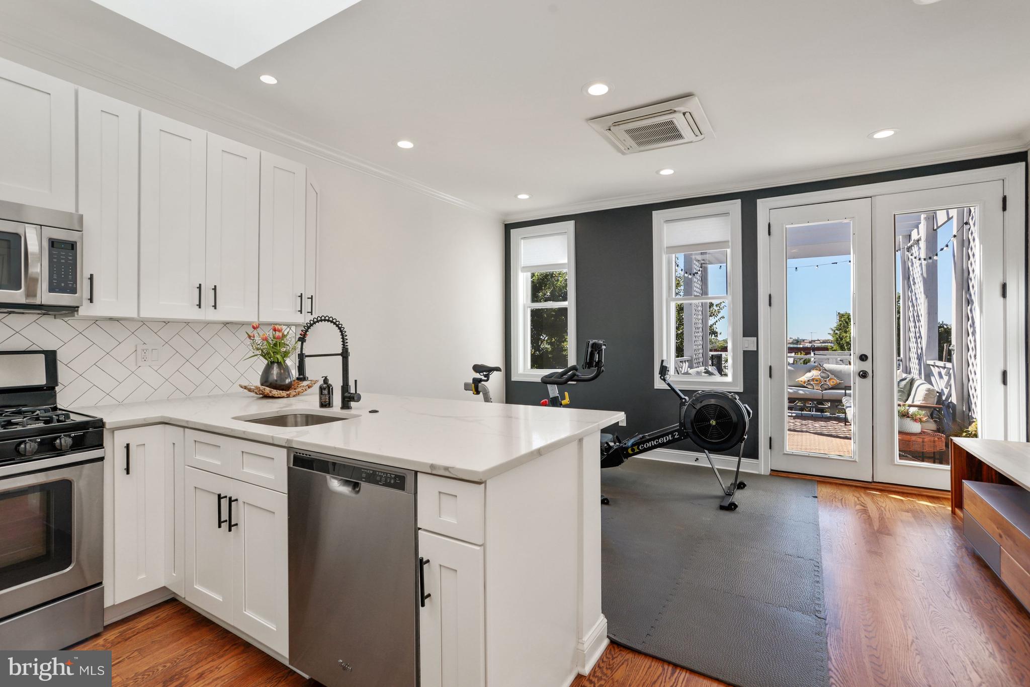 1215 Oates Street Northeast Washington, DC 20002 - Photo 28 of 44 Upper level 2 (3rd level) Kitchen/Family Room