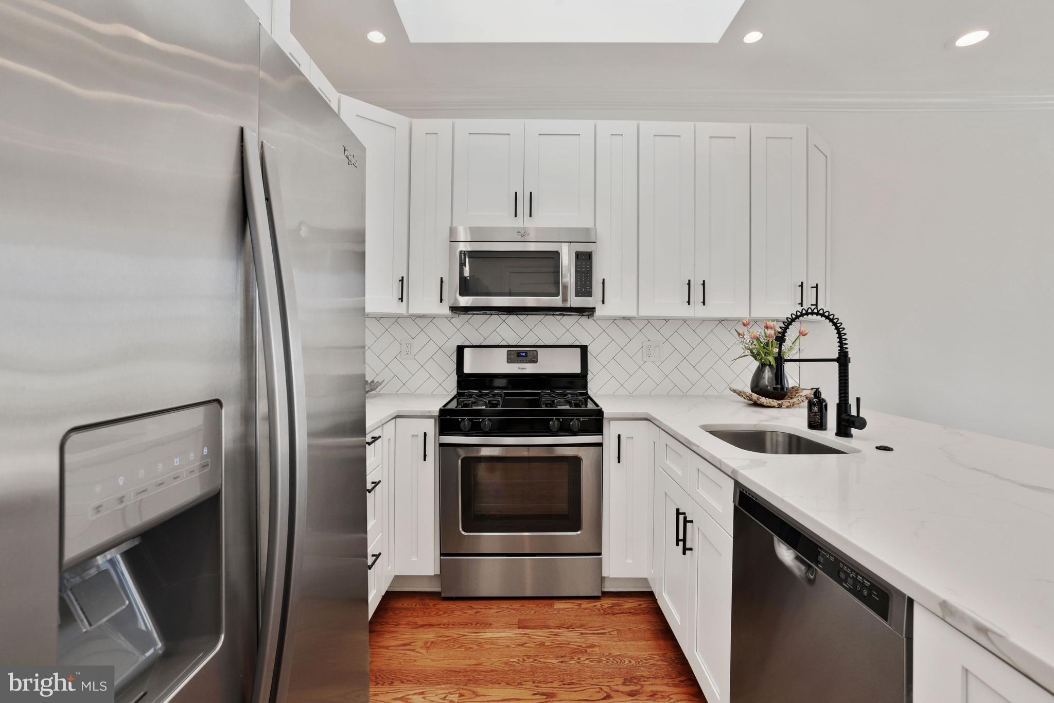 1215 Oates Street Northeast Washington, DC 20002 - Photo 30 of 44 Upper level 2 (3rd level) Kitchen/Family Room